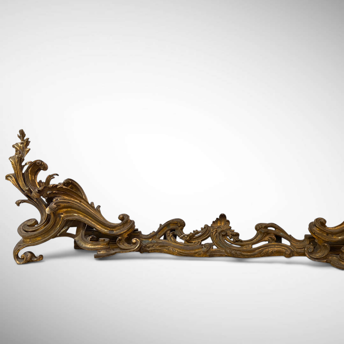 LOUIS XV STYLE CAST AND GILDED BRONZE FIREPLACE FENDER, FRANCE, C. 1850