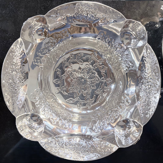 A PAIR OF LATE VICTORIAN REPOUSSÉ STERLING SILVER CENTERPIECES, LONDON, 1889