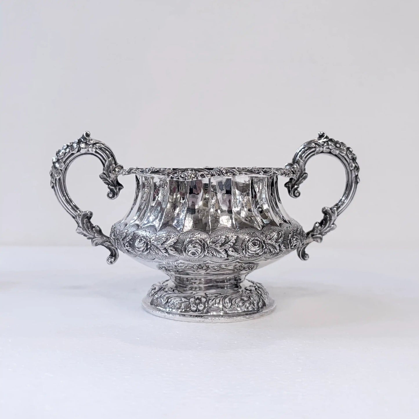GEORGIAN CHASED AND REPOUSSÉ FOUR PIECE SILVER TEA SERVICE, LONDON, 1824