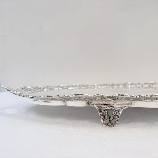 A VICTORIAN PIERCED AND ENGRAVED STERLING SILVER SERVING TRAY, SHEFFIELD, 1894