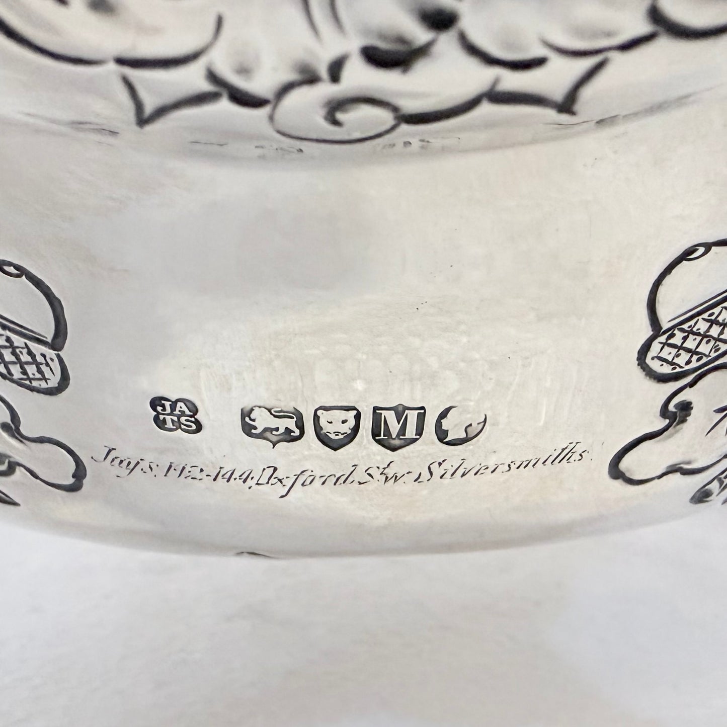 A PAIR OF LATE VICTORIAN REPOUSSÉ STERLING SILVER CENTERPIECES, LONDON, 1889