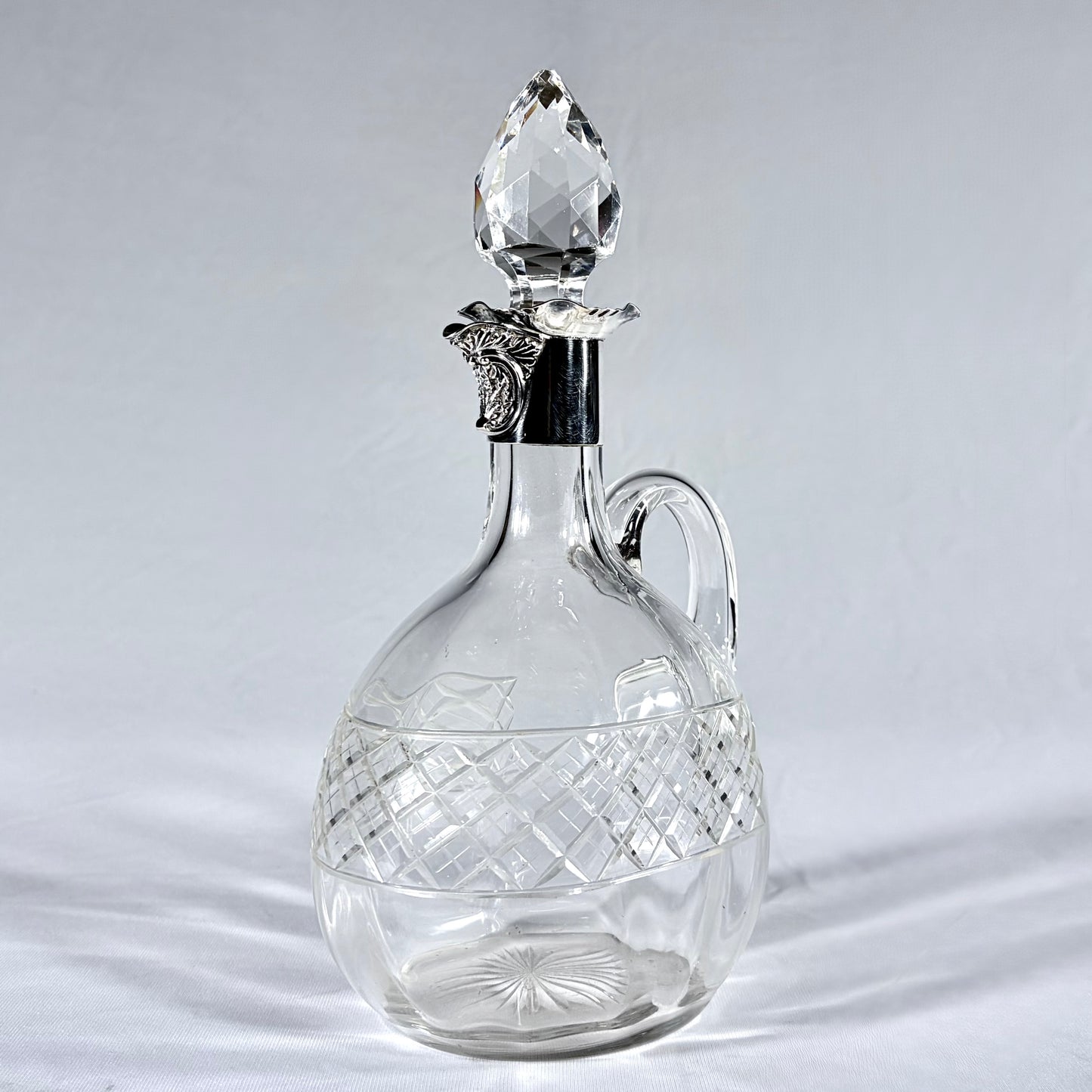 EDWARDIAN DIAMOND-CUT CRYSTAL AND SILVER-MOUNTED CLARET JUG, SHEFFIELD, 1900