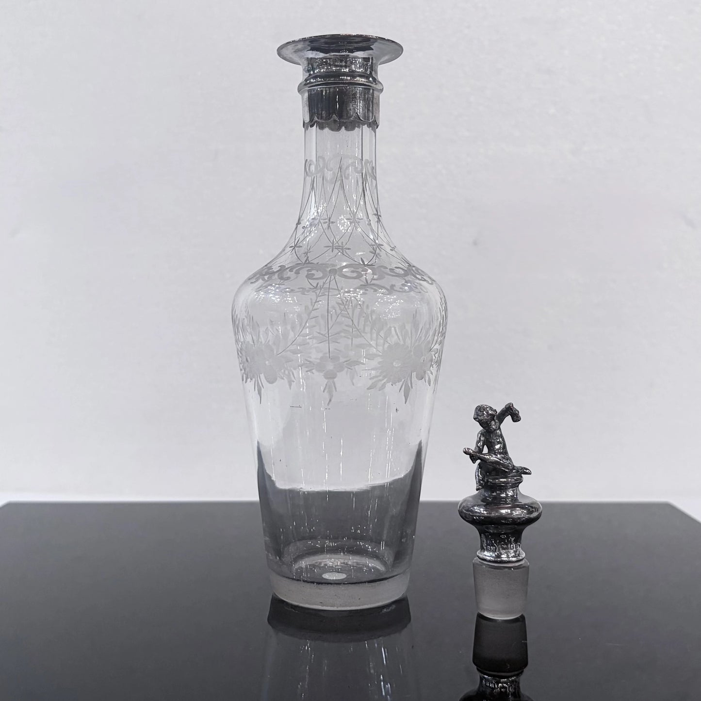 KLS Vaults 1902 Edwardian glass decanter with frosted floral etching and a sterling silver cherub stopper.