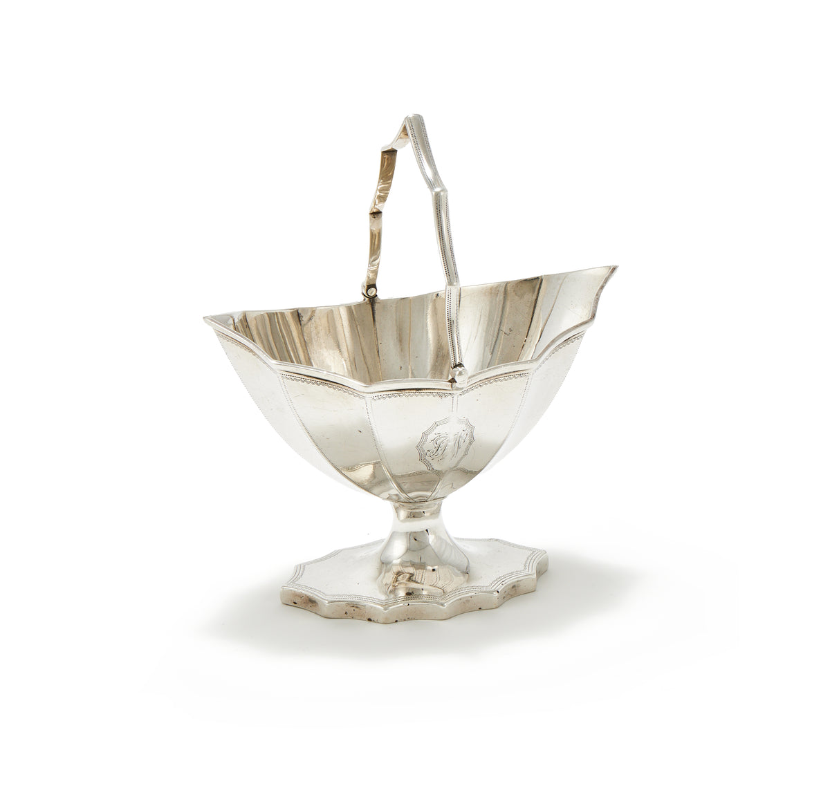 A GEORGE III SILVER SWING-HANDLED SUGAR BASKET, LONDON, 1790