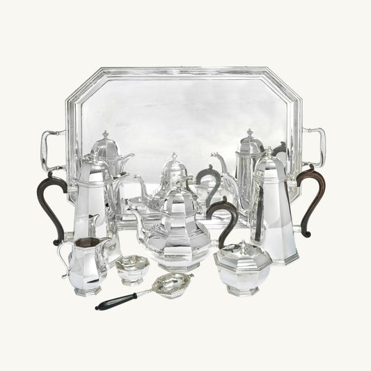 MODERN ELIZABETH II OCTAGONAL STERLING SILVER SEVEN-PIECE TEA AND COFFEE SERVICE, LONDON, 1997