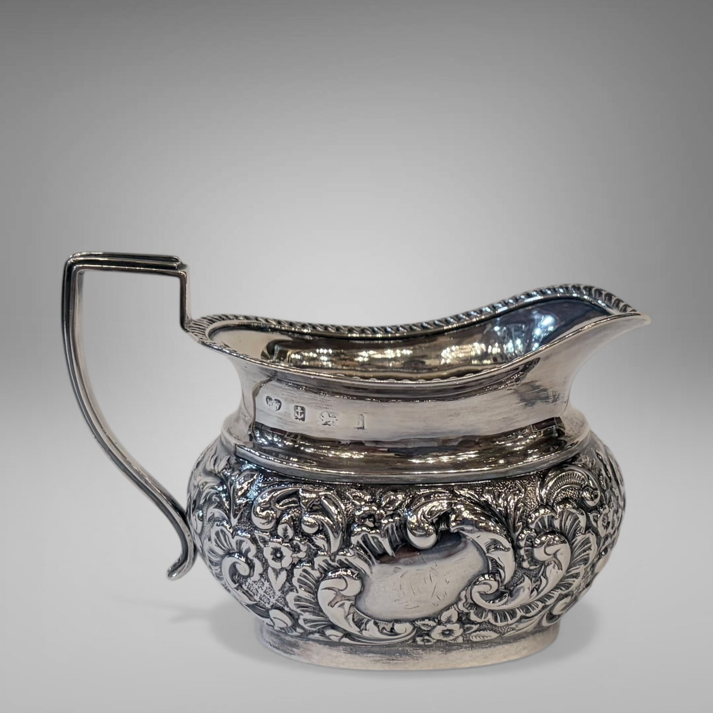 EDWARDIAN REPOUSSÉ STERLING SILVER TEA SERVICE, BIRMINGHAM, 1901