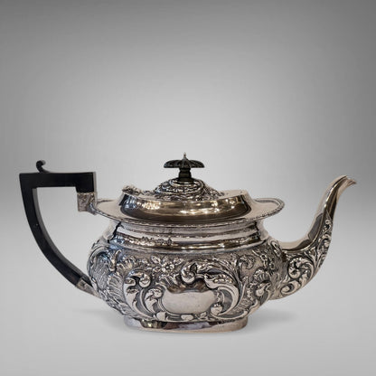 EDWARDIAN REPOUSSÉ STERLING SILVER TEA SERVICE, BIRMINGHAM, 1901