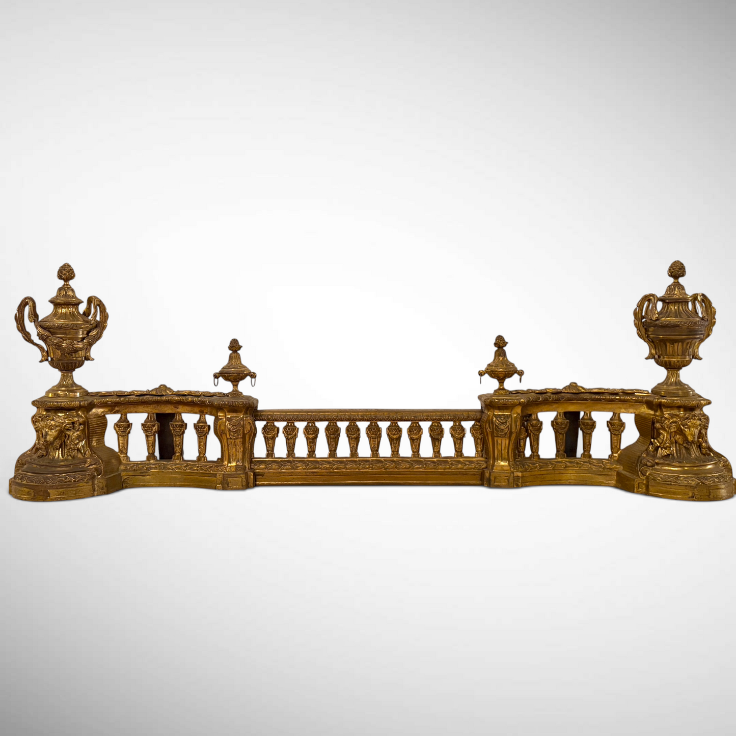 A LOUIS XVI STYLE CAST AND CHASED GILT-BRONZE FENDER, FRANCE, LATE 19TH CENTURY