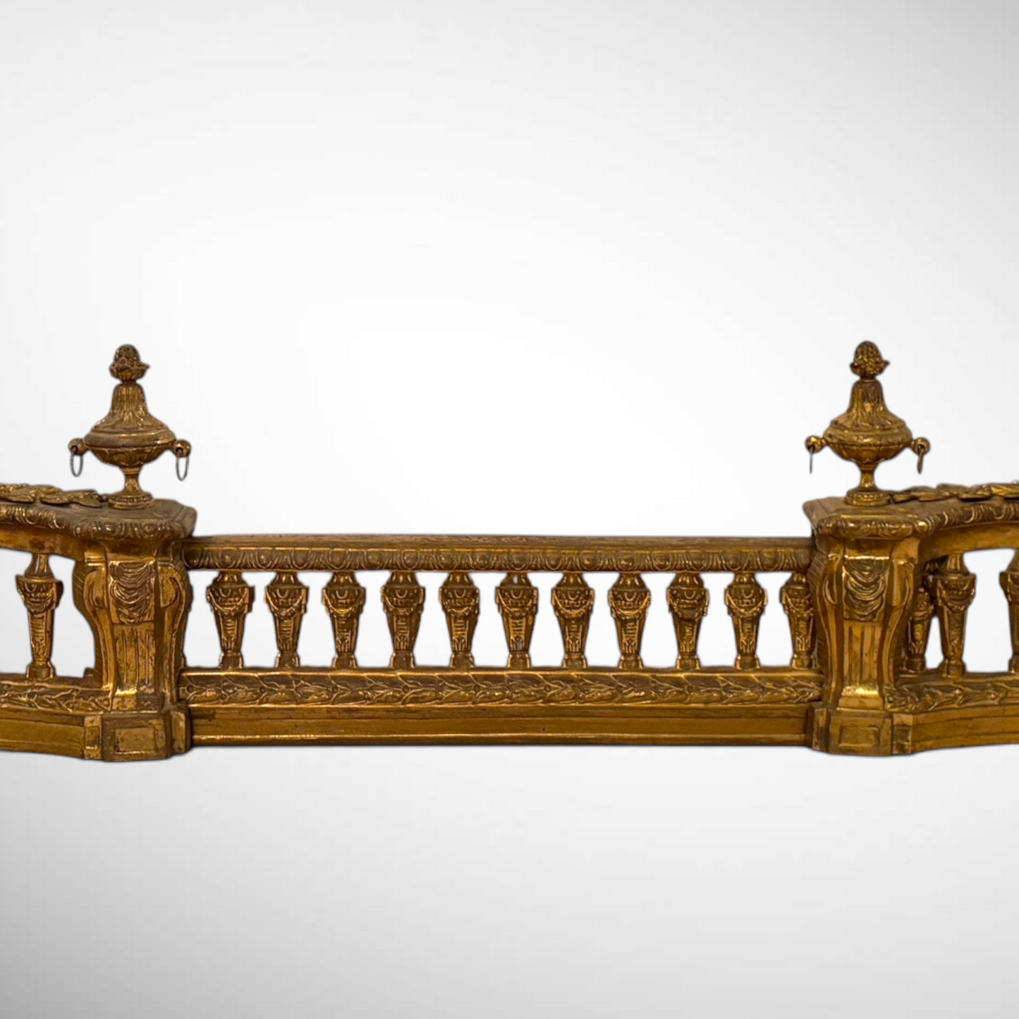 A LOUIS XVI STYLE CAST AND CHASED GILT-BRONZE FENDER, FRANCE, LATE 19TH CENTURY