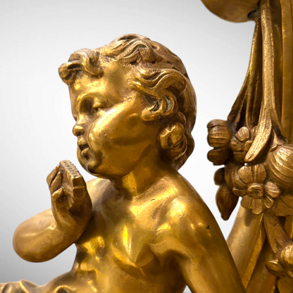 A LOUIS XVI STYLE CHASED AND GILDED FIGURAL ANDIRONS, FRANCE, C. 1870