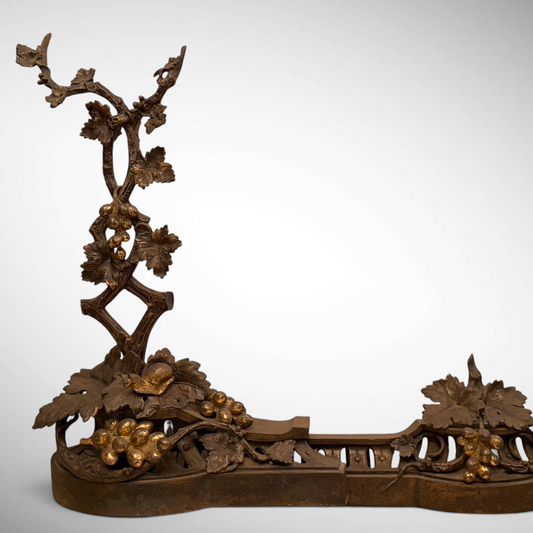 A VICTORIAN PARCEL-GILT BRONZE FIREPLACE FENDER, ENGLAND, C. 1880