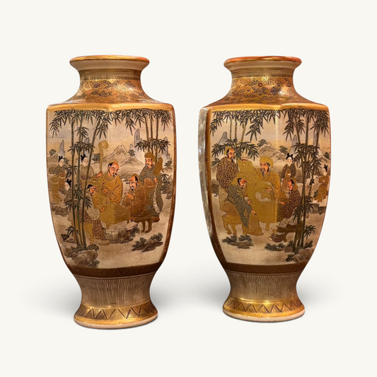 KLS Vaults pair of Meiji period Satsuma earthenware vases with intricate polychrome enamel and gilt figural scenes.