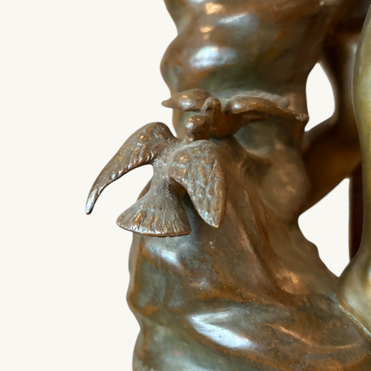 A PATINATED BRONZE FIGURE OF 'AMOUR CHARMEUR', FRANCE, LATE 19TH CENTURY