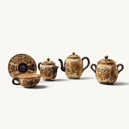 A COBALT AND GILT SATSUMA TEA SERVICE FOR SIX, JAPAN, TAISHŌ PERIOD (1910–1930)