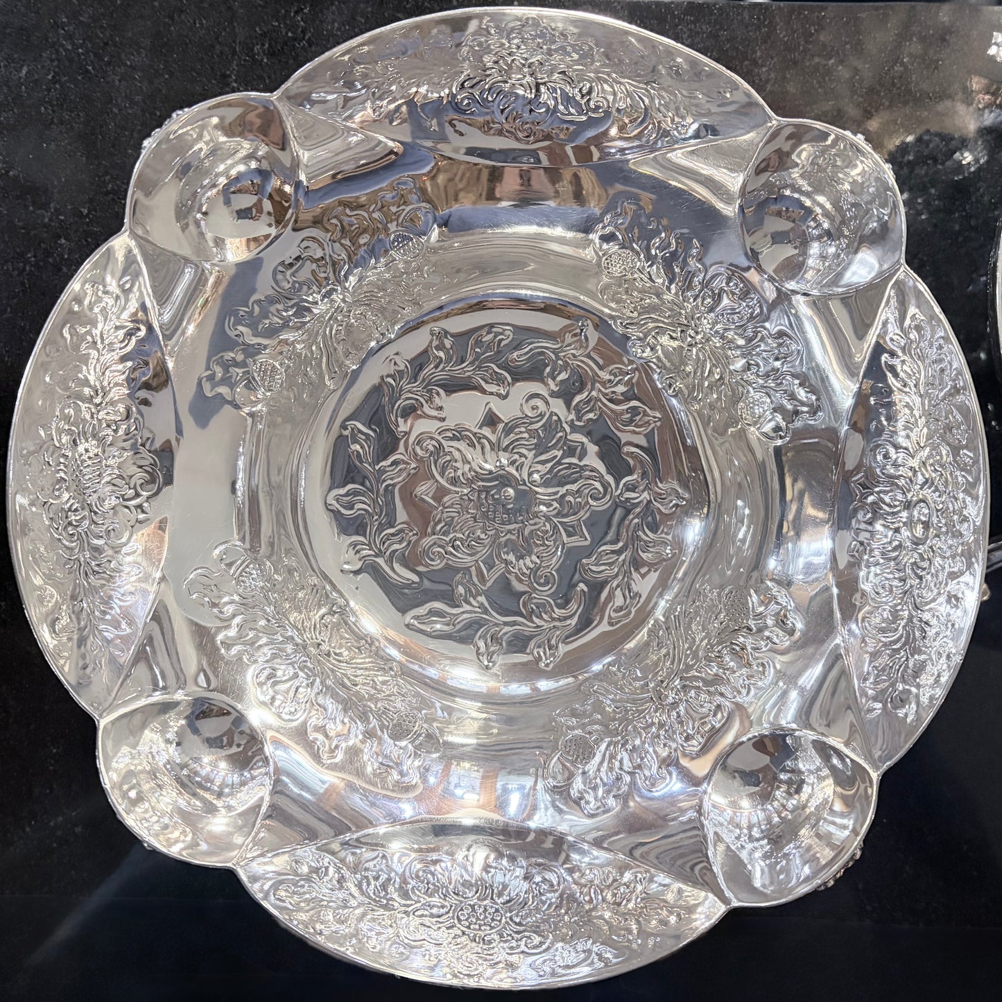 A PAIR OF LATE VICTORIAN REPOUSSÉ STERLING SILVER CENTERPIECES, LONDON, 1889