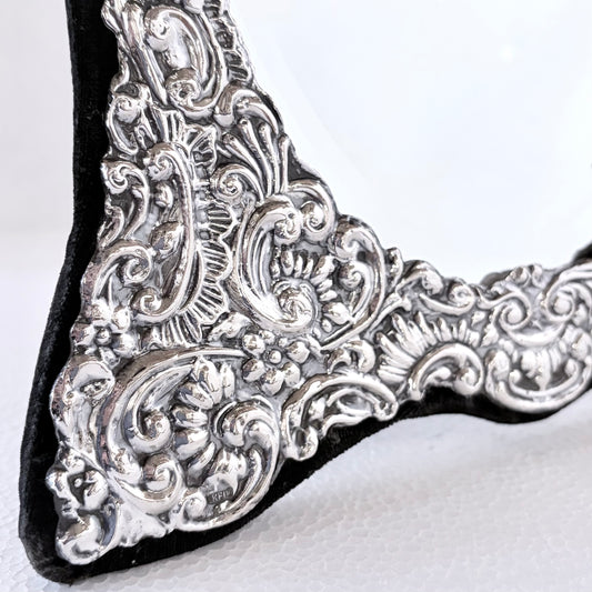 ELIZABETH II REPOUSSÉ SILVER-MOUNTED DRESSING TABLE MIRROR, LONDON, 1988