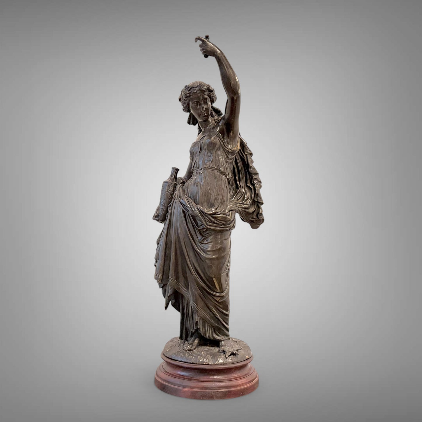 A LATE 19th CENTURY NEOCLASSICAL PATINATED BRONZE FIGURE OF HEBE, FRANCE, C. 1880