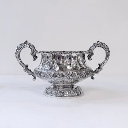 GEORGIAN CHASED AND REPOUSSÉ FOUR PIECE SILVER TEA SERVICE, LONDON, 1824