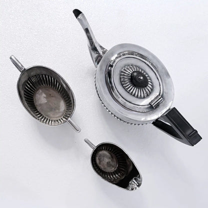 EDWARDIAN GADROONED SILVER MARRIED THREE-PIECE TEA SERVICE, BIRMINGHAM AND SHEFFIELD, 1904-1916