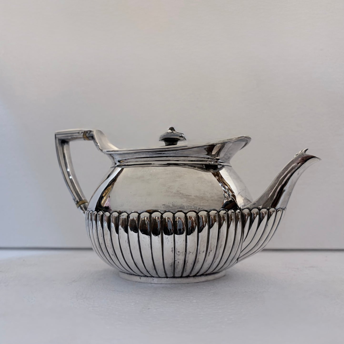 VICTORIAN FLUTED STERLING SILVER TEA SERVICE, LONDON, 1878