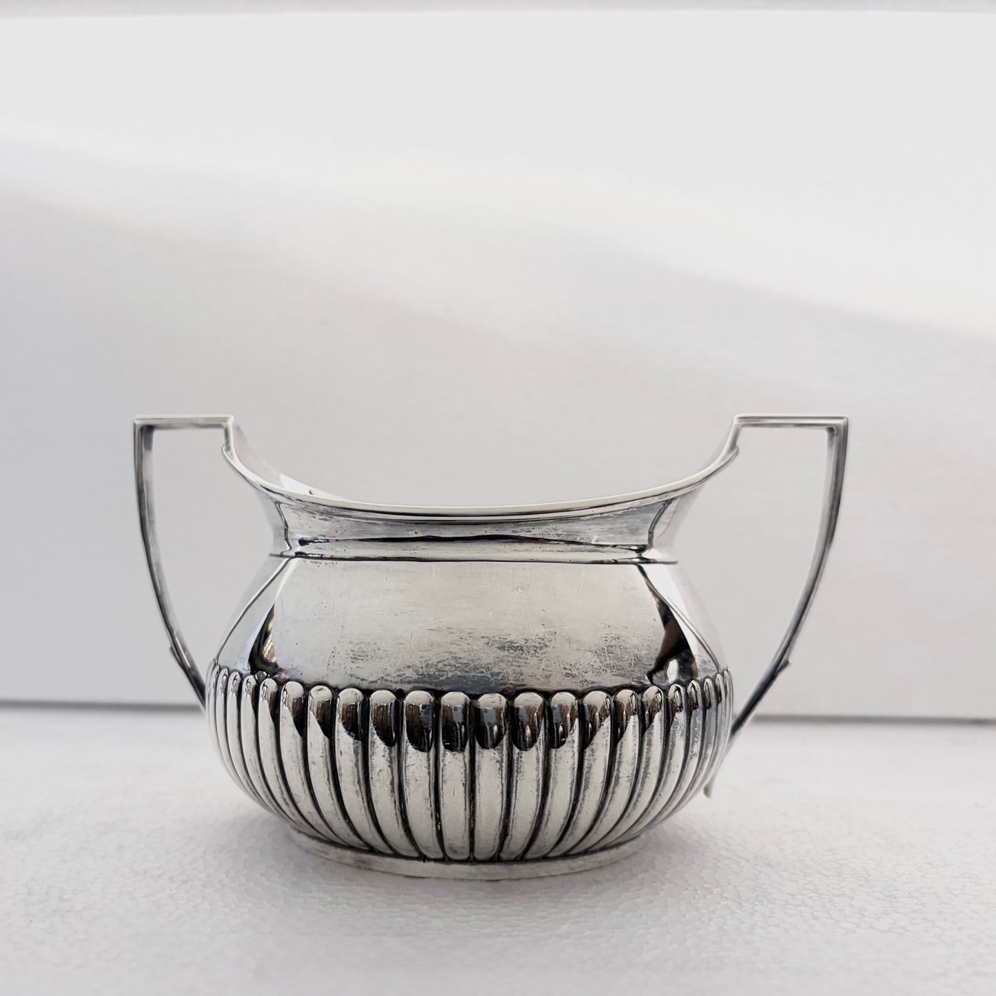 VICTORIAN FLUTED STERLING SILVER TEA SERVICE, LONDON, 1878