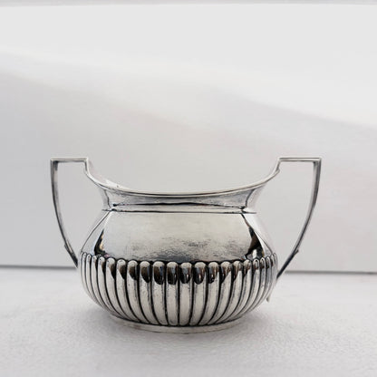 VICTORIAN FLUTED STERLING SILVER TEA SERVICE, LONDON, 1878
