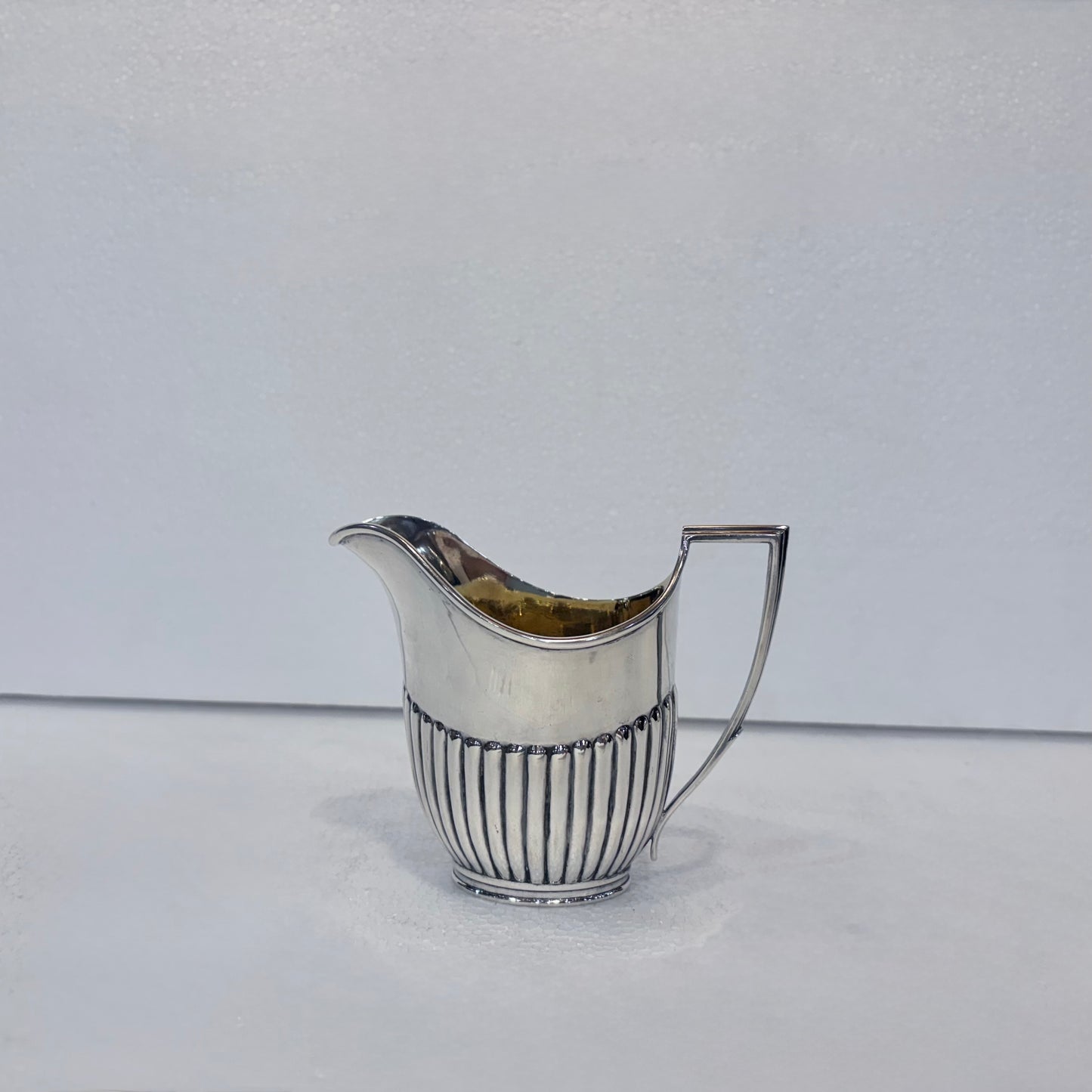 VICTORIAN FLUTED STERLING SILVER TEA SERVICE, LONDON, 1878