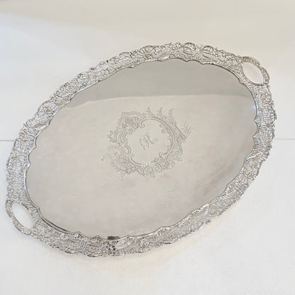 A VICTORIAN PIERCED AND ENGRAVED STERLING SILVER SERVING TRAY, SHEFFIELD, 1894