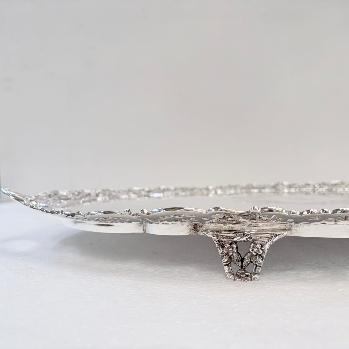 A VICTORIAN PIERCED AND ENGRAVED STERLING SILVER SERVING TRAY, SHEFFIELD, 1894