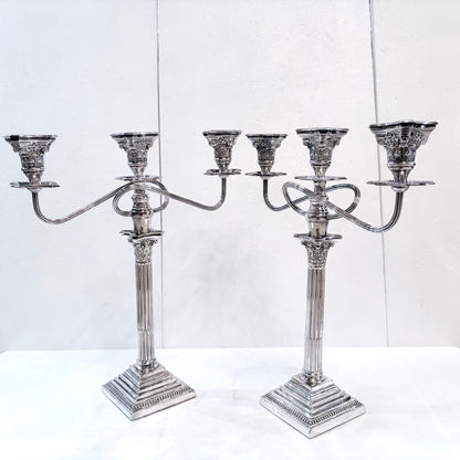 A PAIR OF GEORGE III STYLE CORINTHIAN COLUMN THREE-LIGHT CANDLESTICKS, ENGLISH, 1890