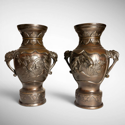 PAIR OF MEIJI PERIOD RELIEF-CAST BRONZE VASES, JAPAN, C.1870–1900