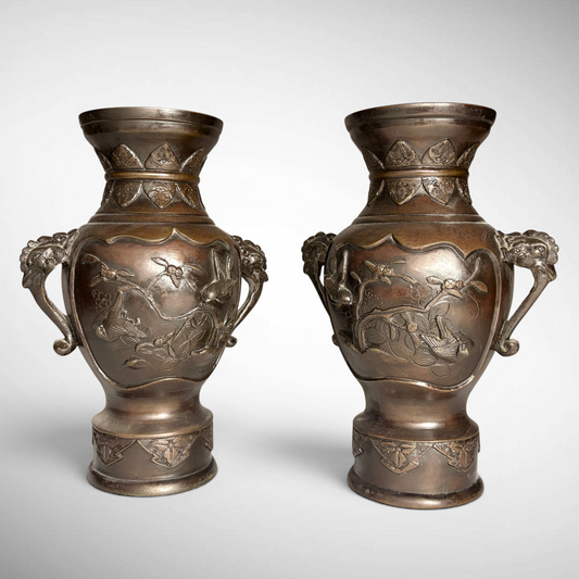 PAIR OF MEIJI PERIOD RELIEF-CAST BRONZE VASES, JAPAN, C.1870–1900