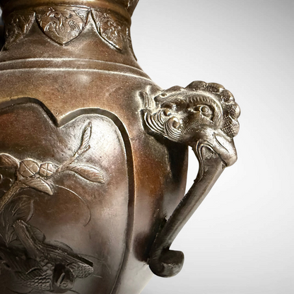PAIR OF MEIJI PERIOD RELIEF-CAST BRONZE VASES, JAPAN, C.1870–1900