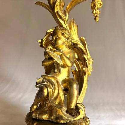 A PAIR OF LOUIS XV STYLE GILT BRONZE FIGURAL FOUR-LIGHT CANDELABRA, FRANCE, 19TH CENTURY