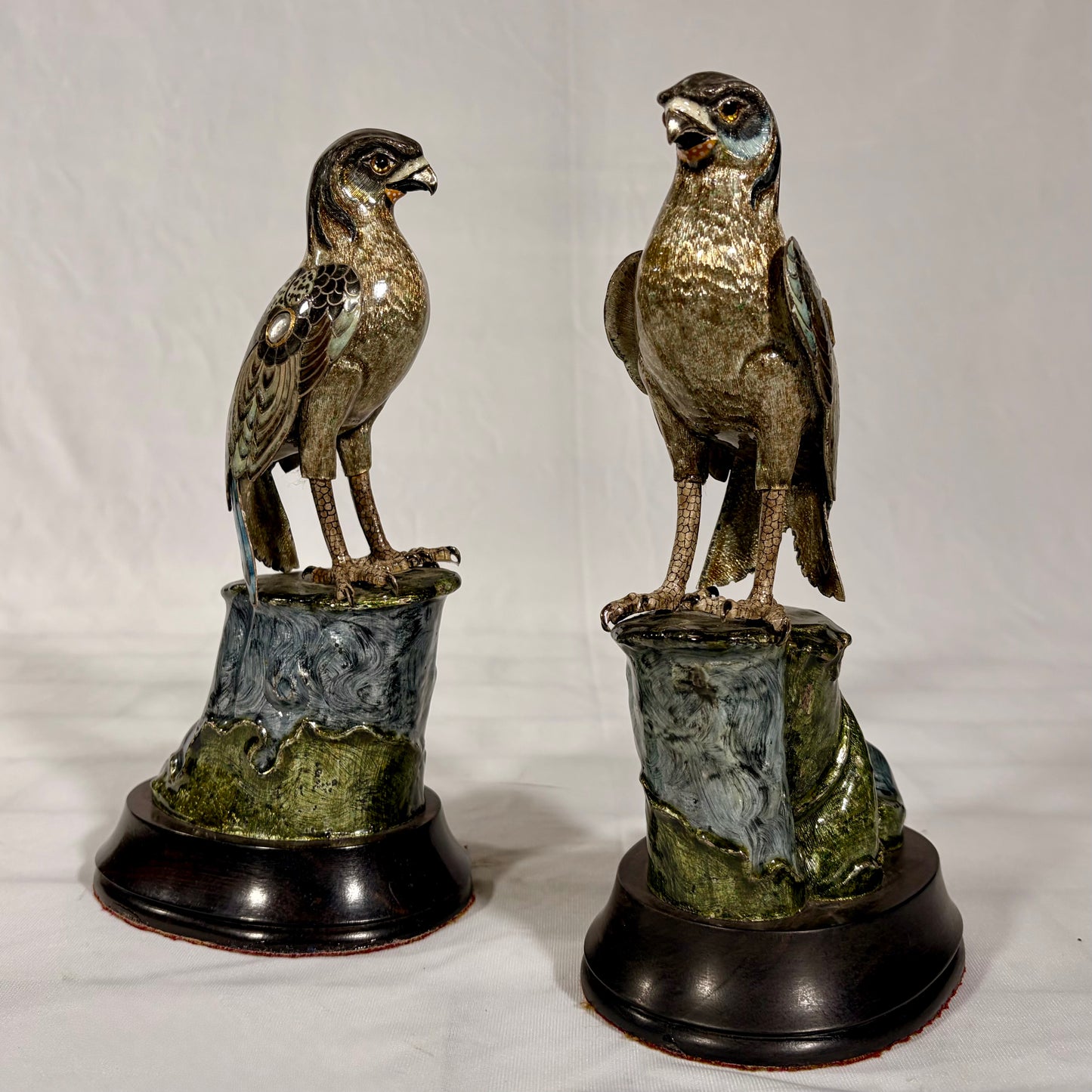 A PAIR OF GILT-SILVER AND ENAMEL MODELS OF FALCONS, JAPAN, MEIJI PERIOD