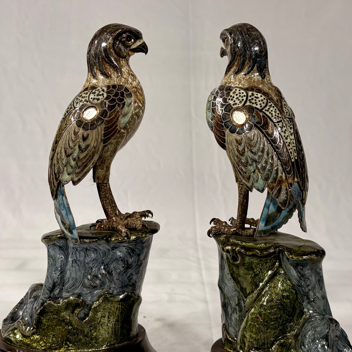 A PAIR OF GILT-SILVER AND ENAMEL MODELS OF FALCONS, JAPAN, MEIJI PERIOD