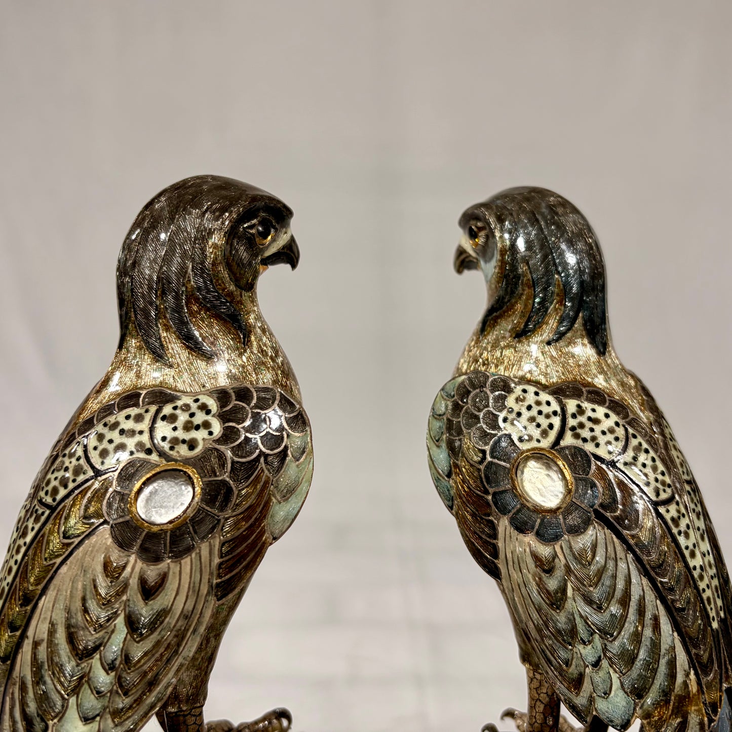 A PAIR OF GILT-SILVER AND ENAMEL MODELS OF FALCONS, JAPAN, MEIJI PERIOD