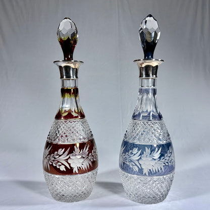 PAIR OF ELIZABETH II CUT-TO-CLEAR SILVER-MOUNTED GLASS DECANTERS, LONDON, 1971