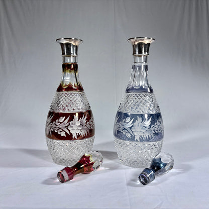 PAIR OF ELIZABETH II CUT-TO-CLEAR SILVER-MOUNTED GLASS DECANTERS, LONDON, 1971