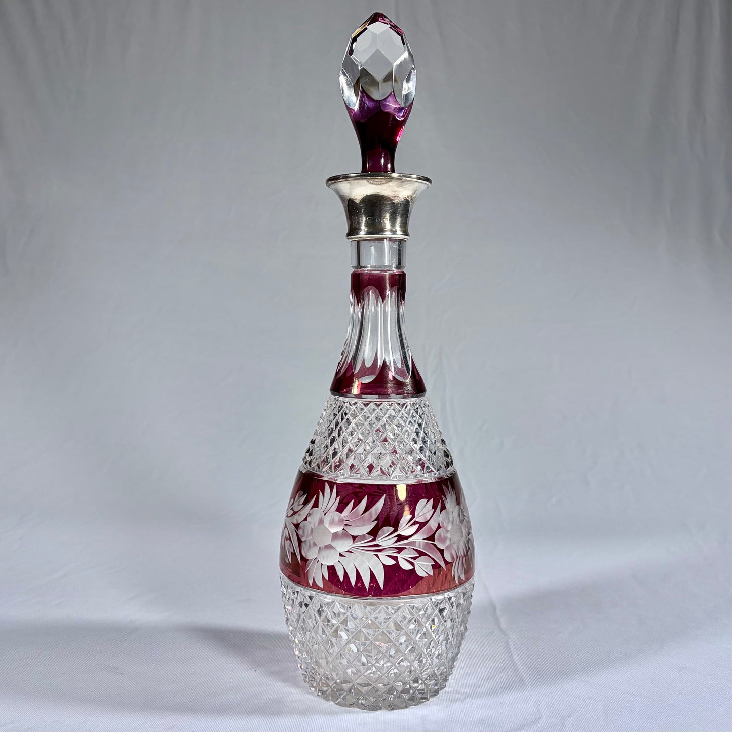 CUT AND WHEEL ENGRAVED BOHEMIAN GLASS AND STERLING SILVER DECANTER, LONDON, 1973
