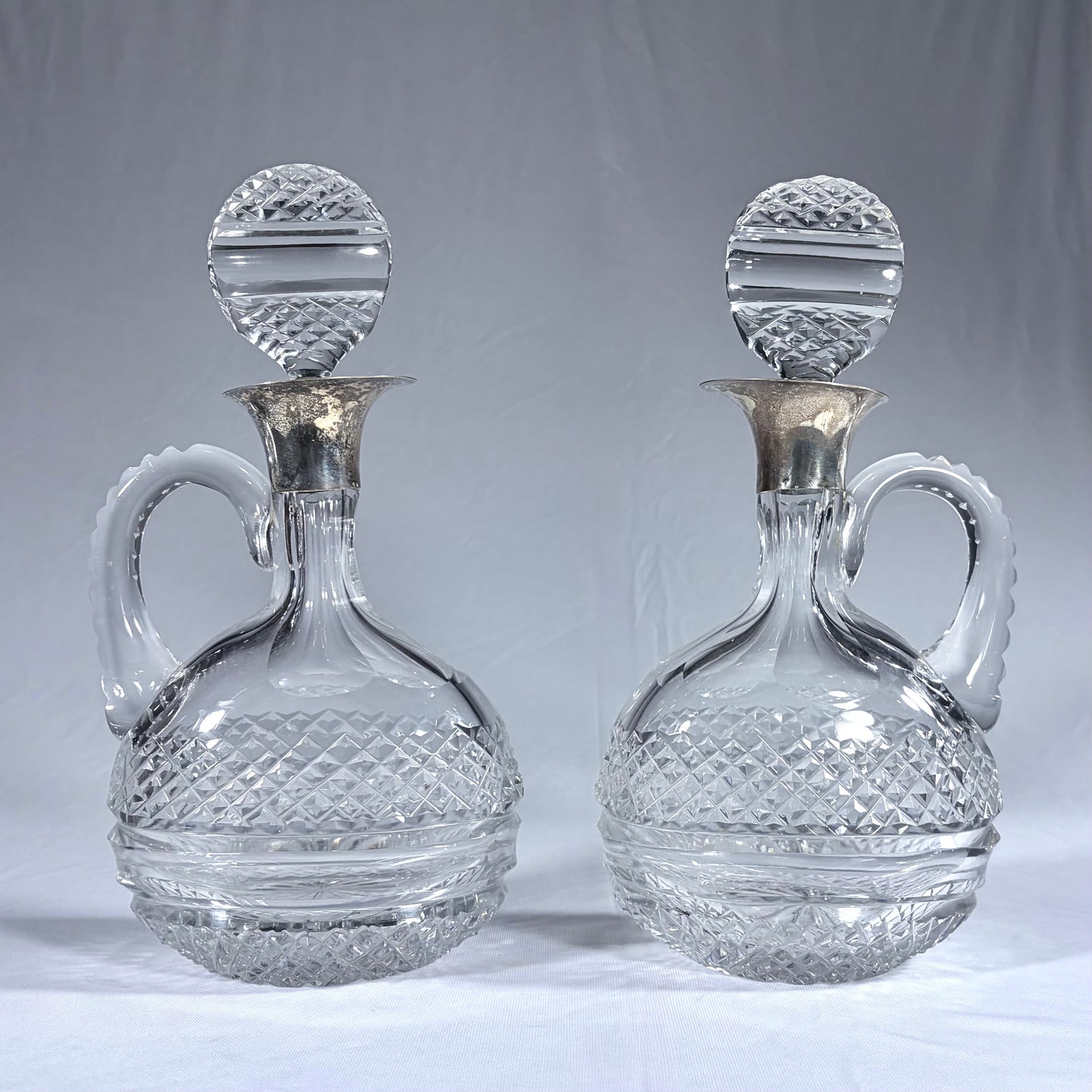 PAIR OF VICTORIAN DIAMOND-CUT CRYSTAL CLARET JUGS, EUROPE, LATE 19th CENTURY