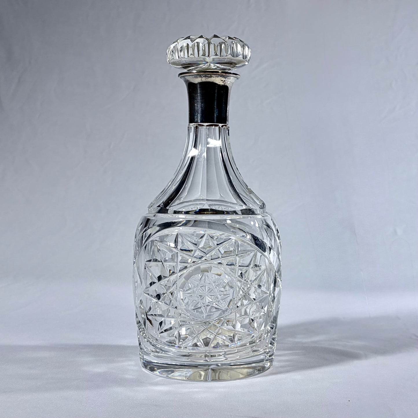GEORGE VI CUT CRYSTAL AND STERLING SILVER DECANTER, BIRMINGHAM, 1936