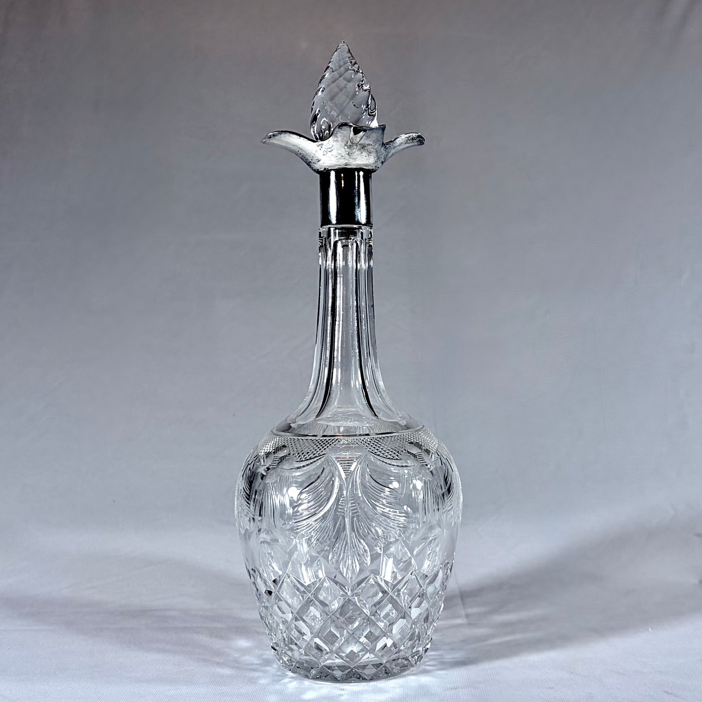 GEORGE V CUT GLASS AND STERLING SILVER MOUNTED DECANTER, SHEFFIELD, 1929