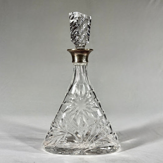 TRIANGULAR CUT-GLASS AND STERLING SILVER-MOUNTED DECANTER, LONDON, 1968