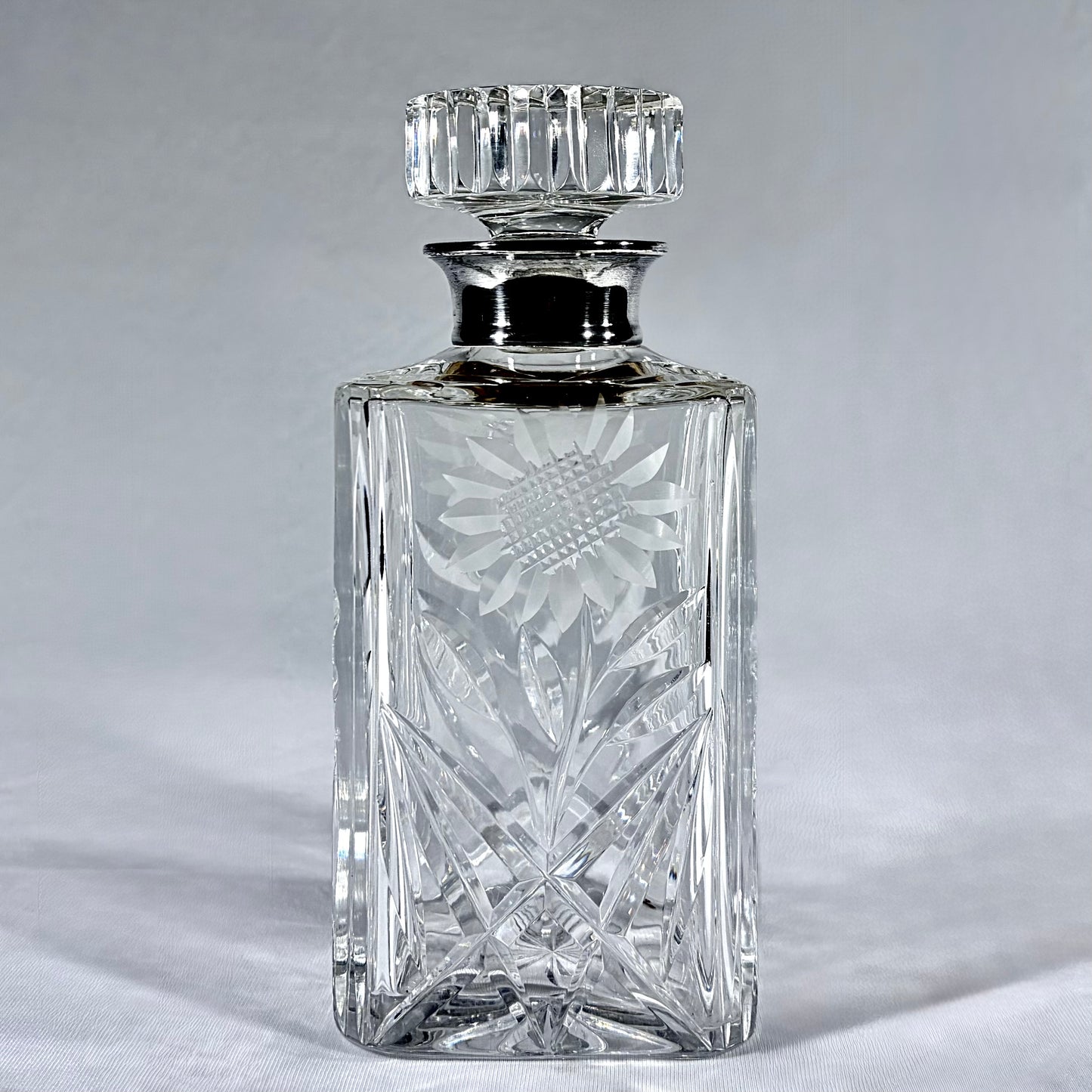 MID-CENTURY CUT-GLASS AND SILVER MOUNTED DECANTER, LONDON, c. 1930s - 1950s