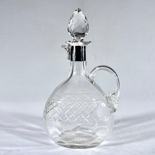 EDWARDIAN DIAMOND-CUT CRYSTAL AND SILVER-MOUNTED CLARET JUG, SHEFFIELD, 1900