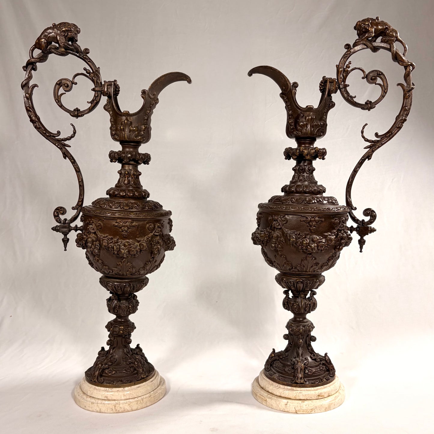 PAIR OF ROCOCO REVIVAL PATINATED BRONZE EWERS, FRANCE, LATE 19TH CENTURY