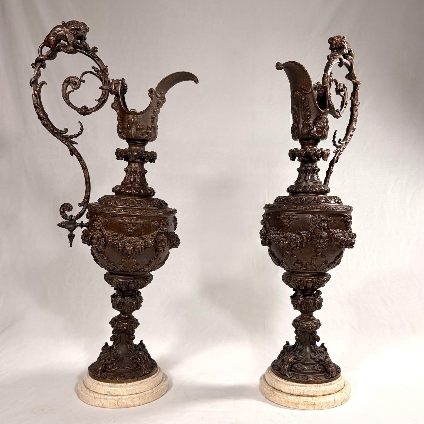 PAIR OF ROCOCO REVIVAL PATINATED BRONZE EWERS, FRANCE, LATE 19TH CENTURY