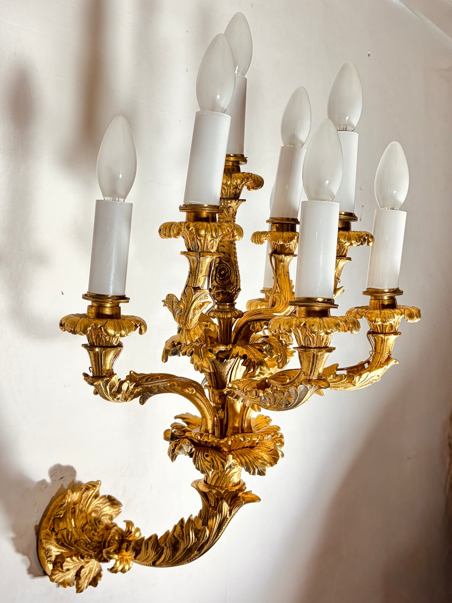 A PAIR OF LOUIS XV STYLE GILT BRONZE EIGHT-LIGHT WALL LIGHTS, FRANCE, 19TH CENTURY