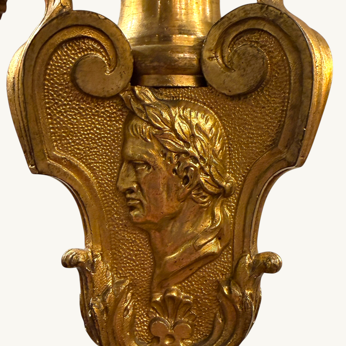 KLS Vaults 19th-century gilt-bronze candelabrum stem featuring a detailed Roman emperor profile in an oval frame.